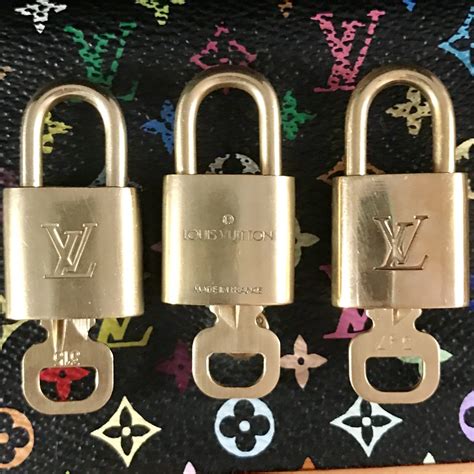 louis vuitton lock and key|authentic louis vuitton key pouch.